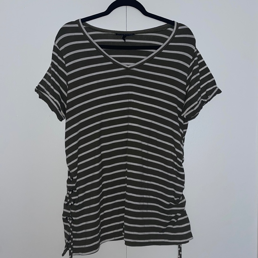 Green and white striped shirt.